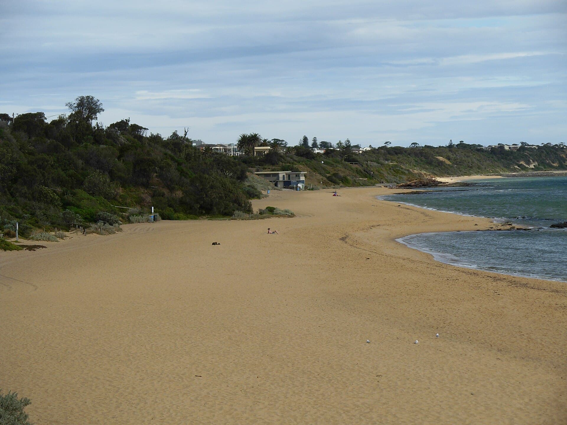 A wide, quiet stretch of Sandringham Beach in Victoria, looking south from Picnic Point.